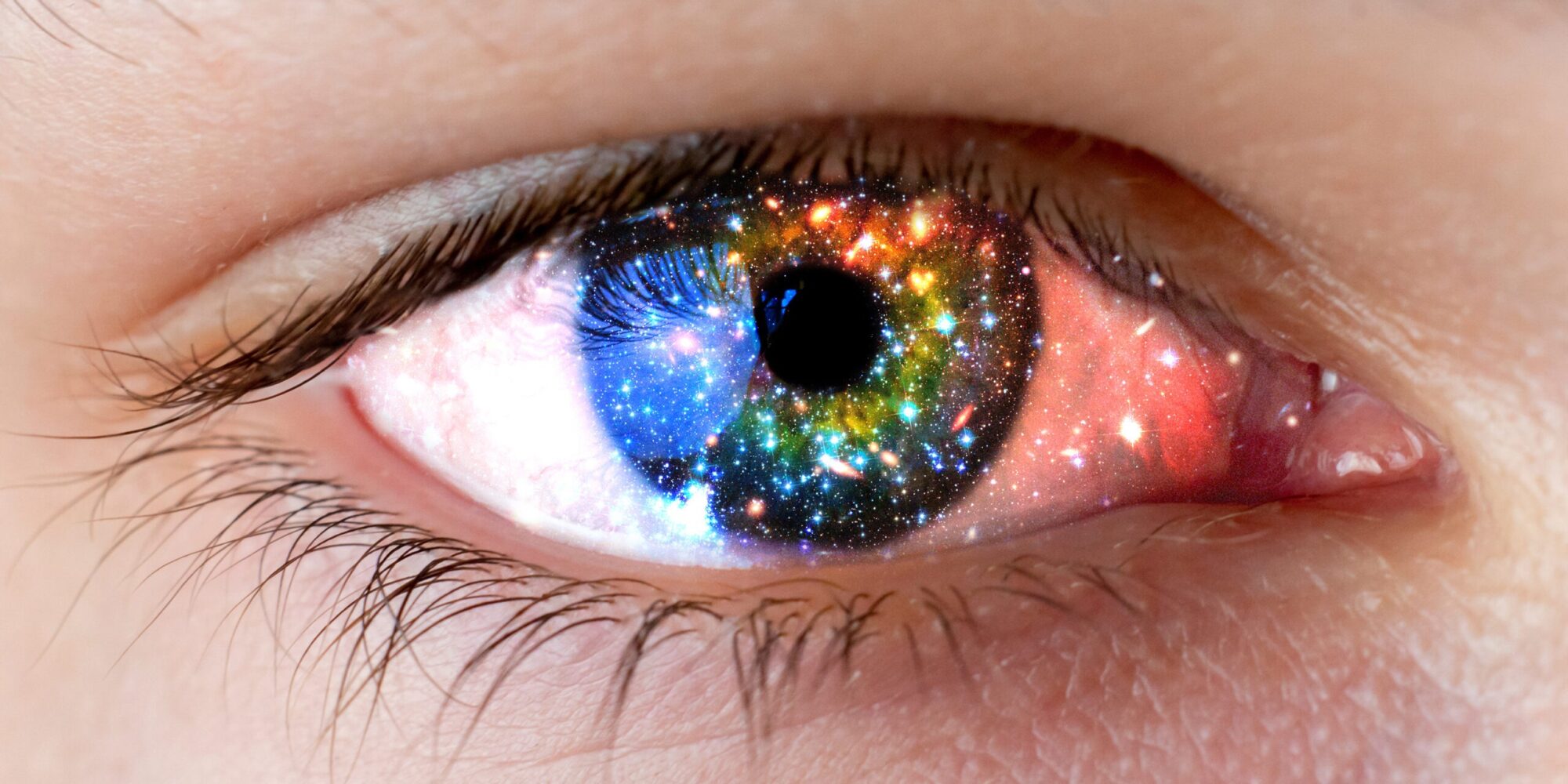 Macro,Shot,Of,The,Person's,Eye,With,Universe,Galaxy,Space