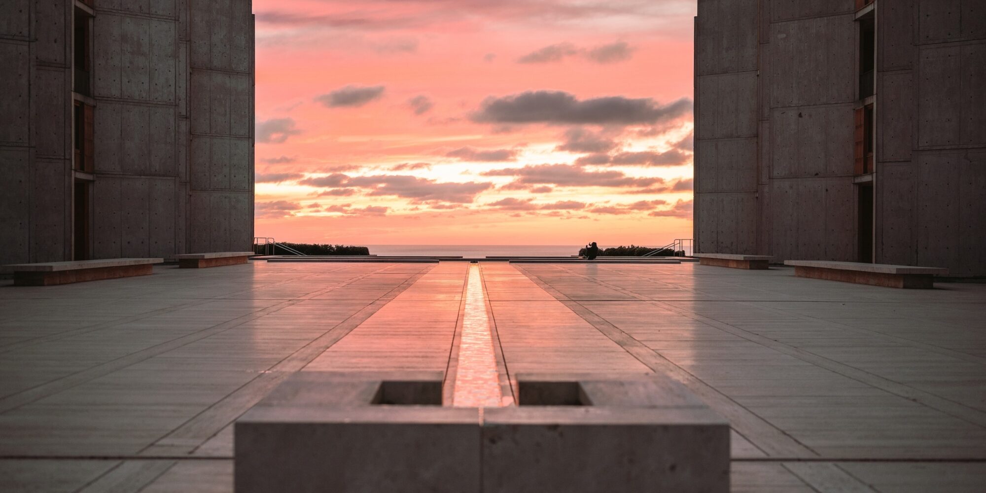 The courtyard and stream at the Salk Institute, San Diego at sunset. With its ritualistic, brutalist design. Designed by the famous Kahn.