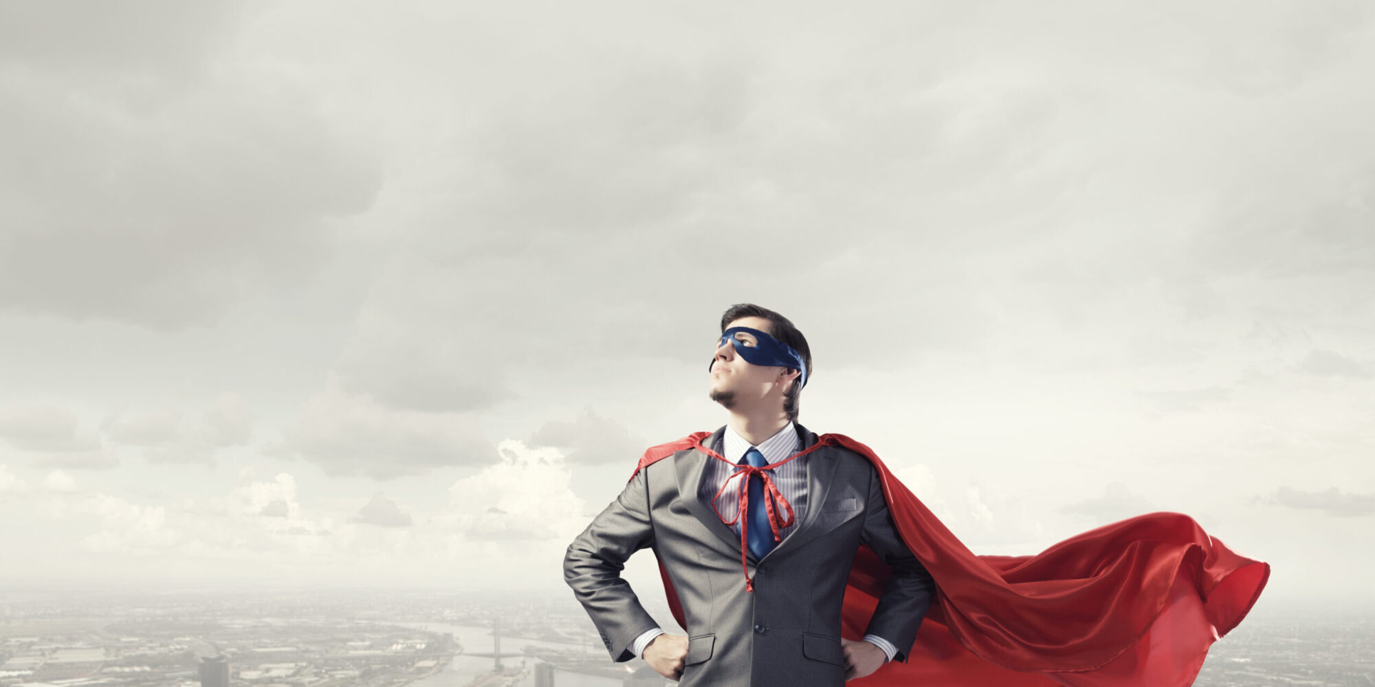 Young,Confident,Super,Businessman,In,Mask,And,Cape Young,Confident,Super,Businessman,In,Mask,And,Cape