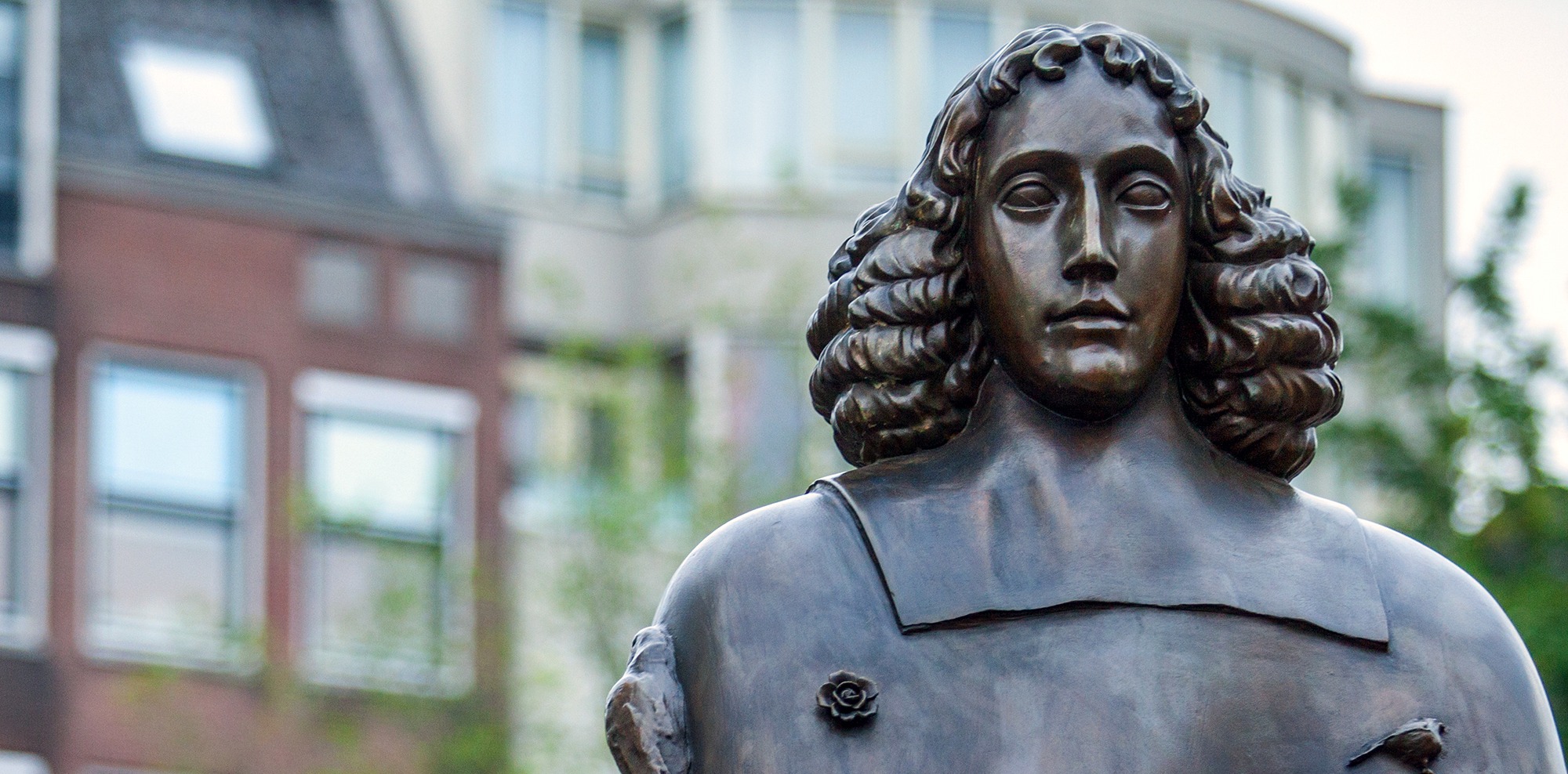 AMSTERDAM, NETHERLANDS - AUGUST 22: City sculpture from bronze of Spinoza on August 22, 2015 in Amsterdam.