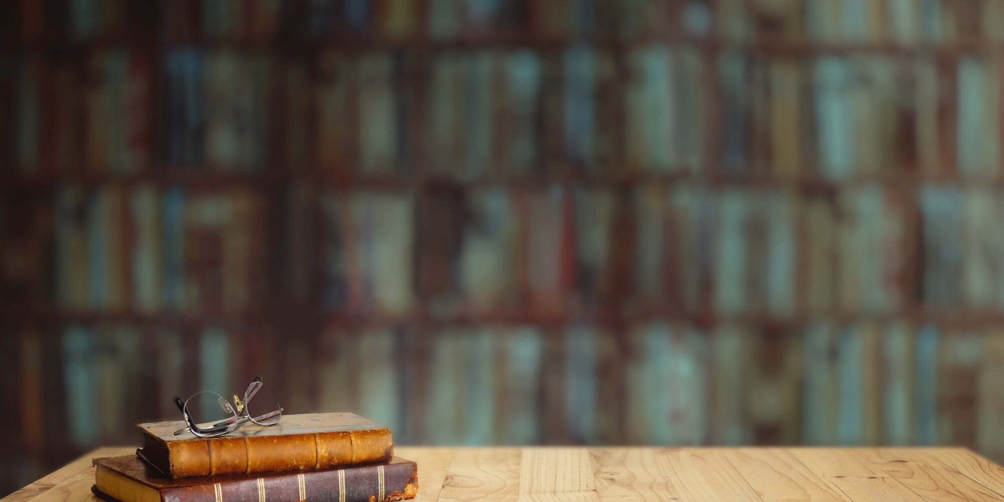 Vintage,Books,On,Table,In,Library.